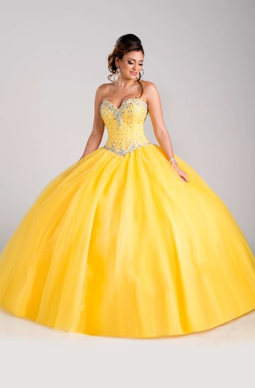 yellow poofy prom dress
